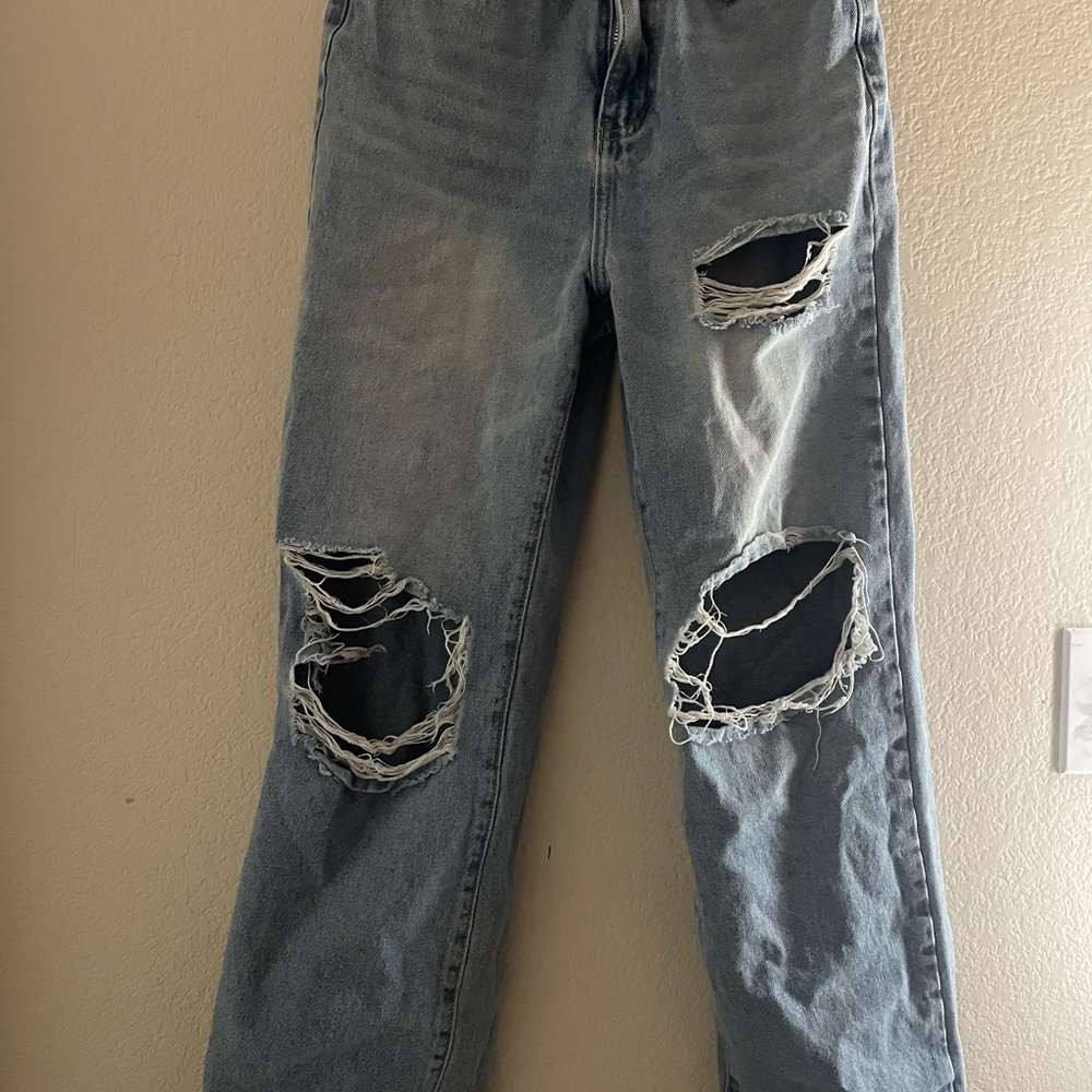 Distressed Light Blue Jeans